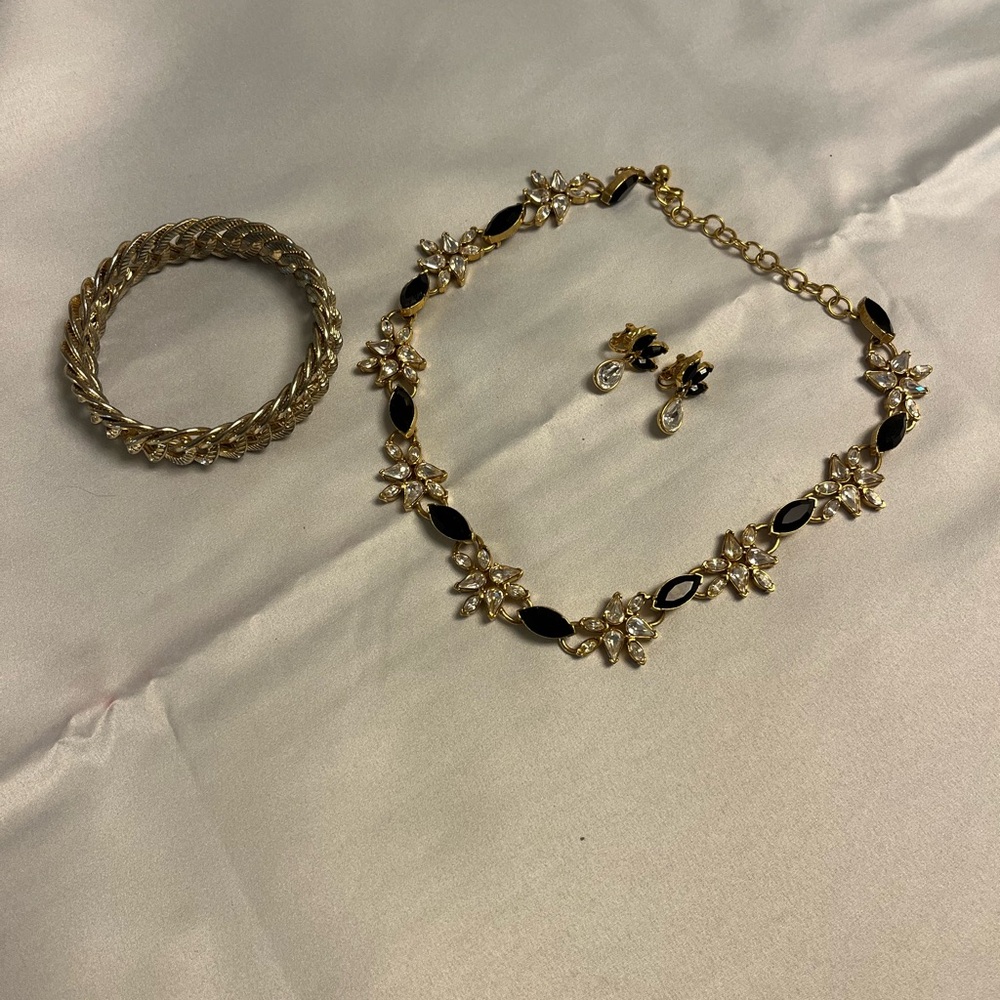 3 for $25. Gold and Black Necklace with Intricate Design